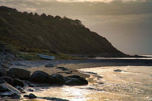 Am Strand von Blåvand bei Sonnenuntergang am Meer