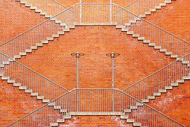 Symmetry on brick red by Alexander Baumann