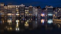 Damrak Amsterdam in de avond van Arnoud van de Weerd thumbnail