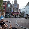 Fietsers op de Oudegracht van Julian Buijzen