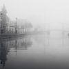 Haarlem: Gravenstenenbrug in the fog. by Olaf Kramer