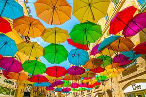 Parapluies colorés sur Ivo de Rooij