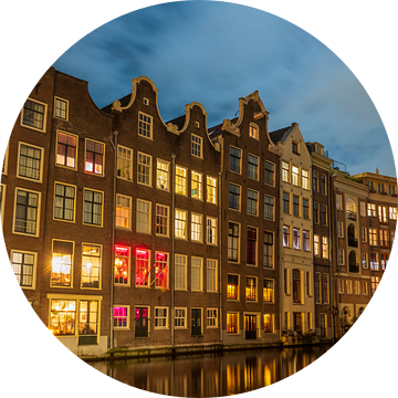 Amsterdamse grachten tijdens een winteravond met verlichte koopwaar van Sjoerd van der Wal Fotografie