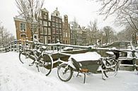 Besneeuwd Amsterdam in de winter in Nederland van Eye on You thumbnail