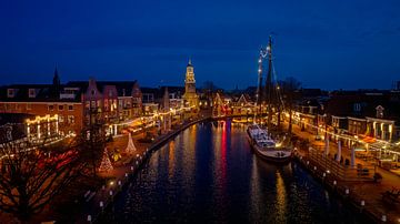 Christmas lights along the waterfront of Lemmer Friesland Netherlands by Eye on You