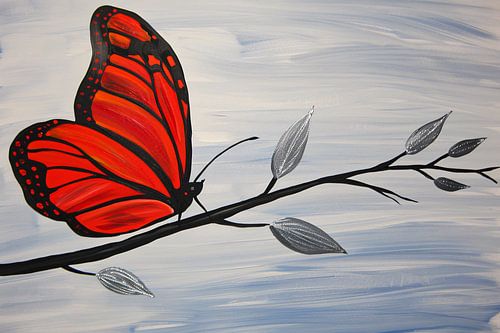 Peinture en silhouette d'un papillon sur une branche
