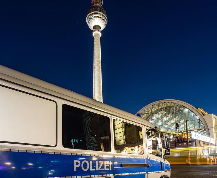 Police vehicle at Alexanderplatz in Berlin by Frank Herrmann