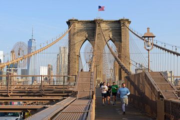 Brooklyn Bridge in New York in the morning with runners by Merijn van der Vliet
