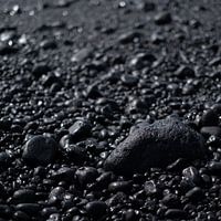 Zonneschitteringen op Zwart Zand