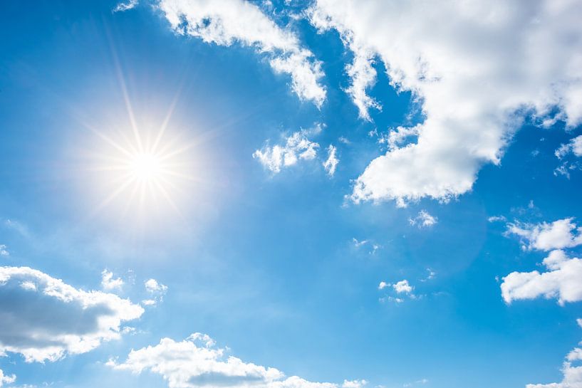 Blue sky with bright sun by Günter Albers