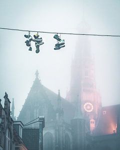 Sneakers on the line in front of the Great Church by Mick van Hesteren