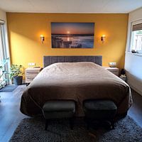 Photo de nos clients: Coucher de soleil sur la plage de Hollum Ameland par Harold van den Hurk, sur toile