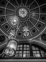 Black and white lights inside a train station, lines.