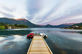View across the Åkrafjord with a jetty in Norway by Rico Ködder