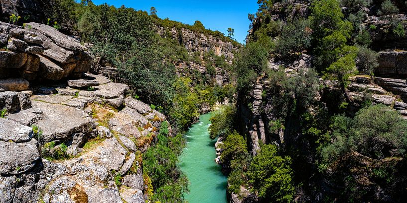 Turquoise-coloured river through rock massif by Photo Art Thomas Klee