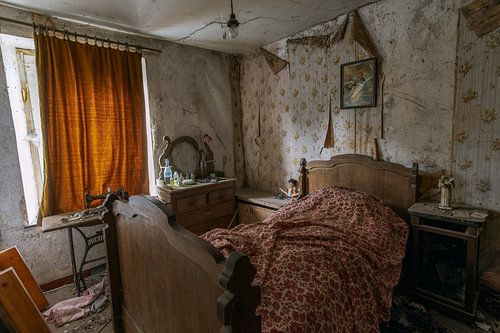 Old-fashioned abandoned bedroom