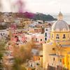 Colourful buildings on Procida, island off the coast near Naples in Italy by Melissa Peltenburg