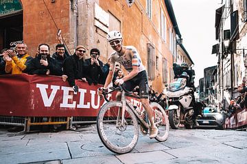 Tadej Pogacar smiling to the victory by Leon van Bon