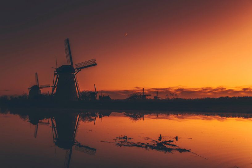 The mills of Kinderdijk at sunrise by Maarten Borsje