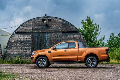 Orange Ford Ranger Wildtrak Pickup.