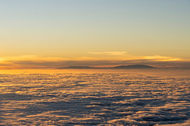 View from Tenerife of the mountains of La Palma above the clouds by Natalia Gebauer Studio