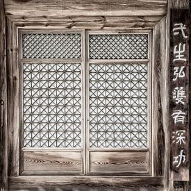 Ancient doors and korean signs in Hwaeomsa temple South Korea by Ron van der Stappen