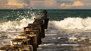 Groynes jutting into the sea. Taken in Zingst, on the Darß. The perspective is directed to the horiz