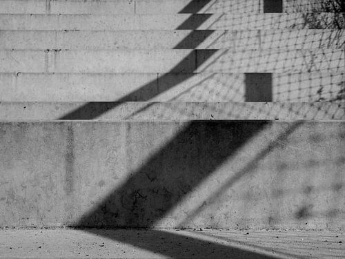 Schaduw op betonnen trap