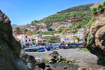 Landscape in Portugal with fishing boats and village on mountain by Ben Schonewille