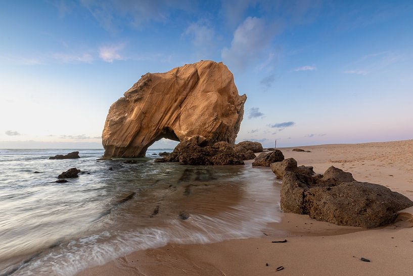 Rock gate on the beach of Santa Cruz in Portugal by Tilo Grellmann