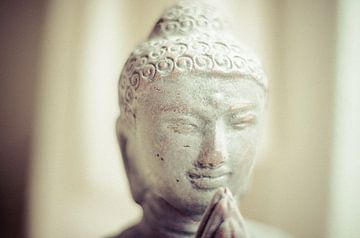 Buddha statue white stone by Andrea Diepeveen