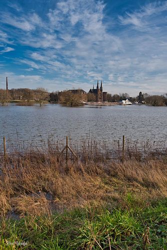 Abbey next to a flooded river