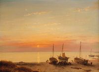 ships on the beach at sunset