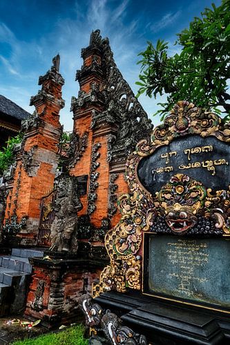 Entrance of beautiful temple, Bali against blue sky