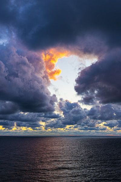 View over the Baltic Sea with clouds and sunset by Rico Ködder