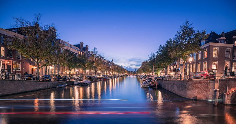 The capital of the Netherlands Amsterdam during blue hour at the canals by Steven World Traveller