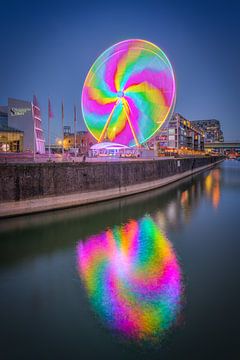 Ferris wheel in Cologne in the evening by Michael Valjak