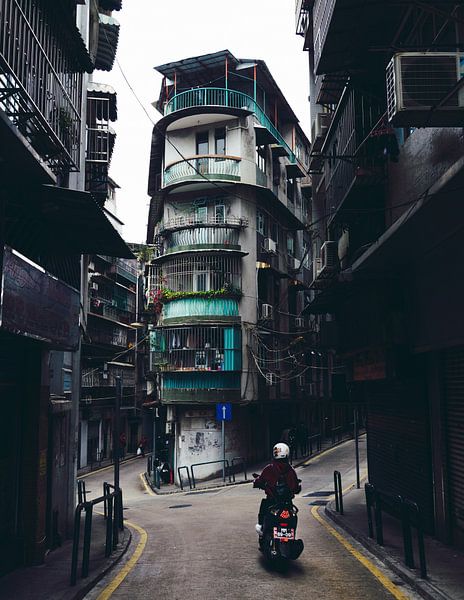 Scooter in the narrow streets of Macao by Rudmer Hoekstra