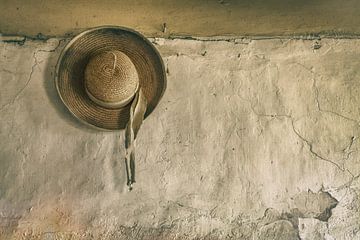 Sun hat on old wall by Ellen Driesse