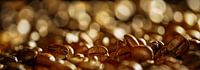 macro-opname van koffiebonen met stralend bokeh