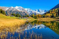 De Schladminger Tauern worden weerspiegeld in de Duisitzkarsee