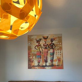 Klantfoto: Afrikaanse gratie - vrouwen in traditionele jurken van Poster Art Shop, op canvas