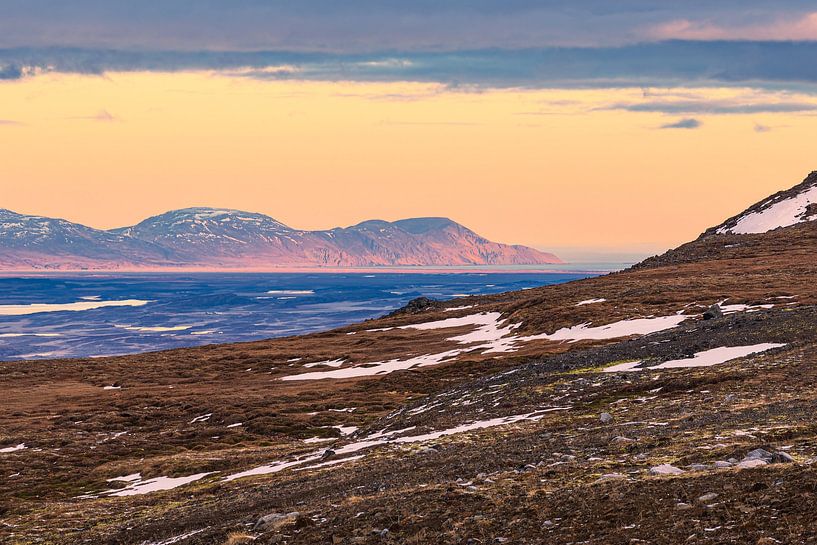 View over the lake Lagarfljót to snow-covered mountains in the east by Rico Ködder