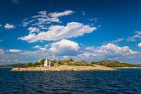 Lighthouse under a blue sky