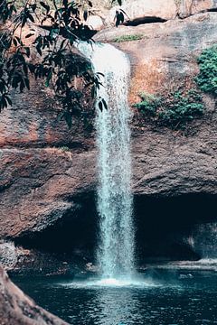 Waterfall and rock in the jungle in Thailand. by Madinja Groenenberg