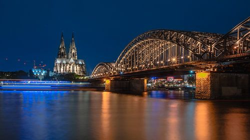 Colorful night photo of a cityscape of Cologne (Germany)