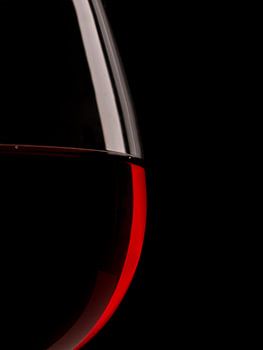Silhouette of a red wine glass