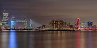 The skyline of Rotterdam with the illuminated bridges