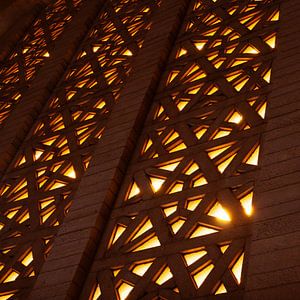 Abstracte zon door een patroon van vensters