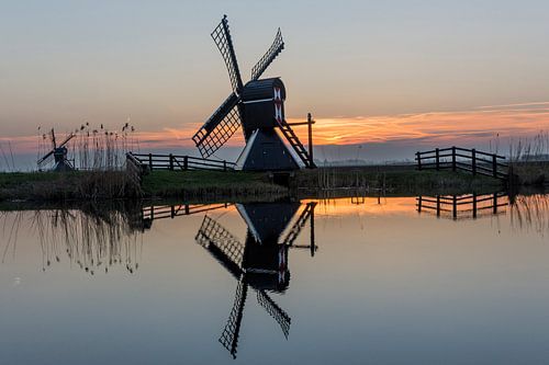 A mill during the sunset in Friesland